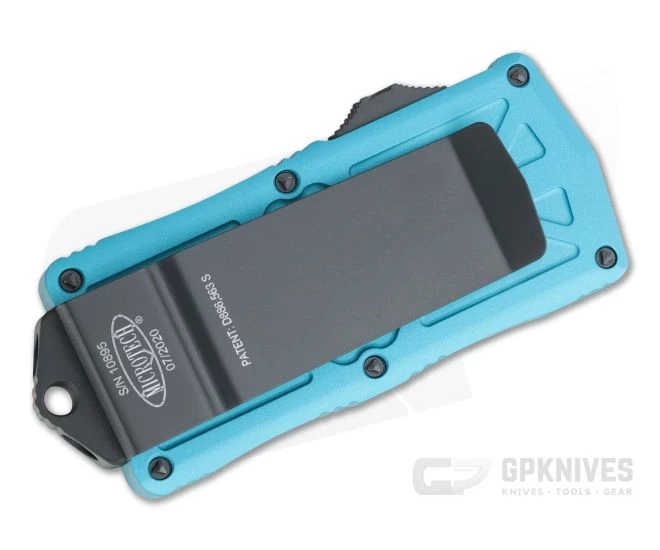 Microtech Exocet Black Partially Serrated 204P Double Edge Turquoise CA Legal OTF Automatic 157-2TQ 2 Microtech Exocet Black Partially Serrated 204P Double Edge Turquoise CA Legal OTF Automatic 157-2TQ - Image 2